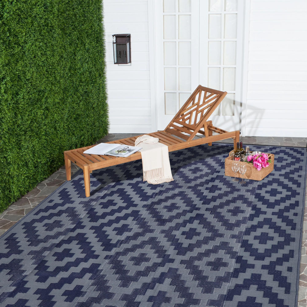 SAND MINE 6' x 9' outdoor rug laid out in garden