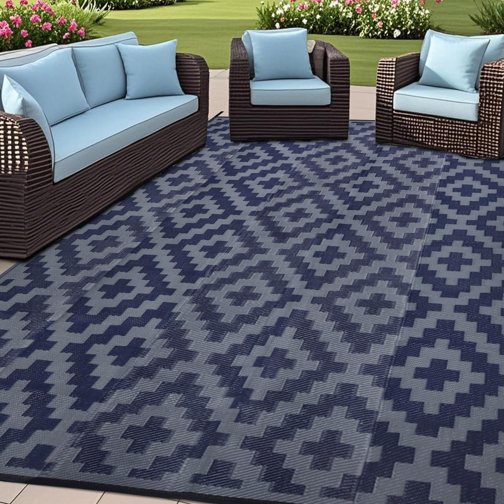 SAND MINE 6' x 9' reversible outdoor rug in blue grey lattice design