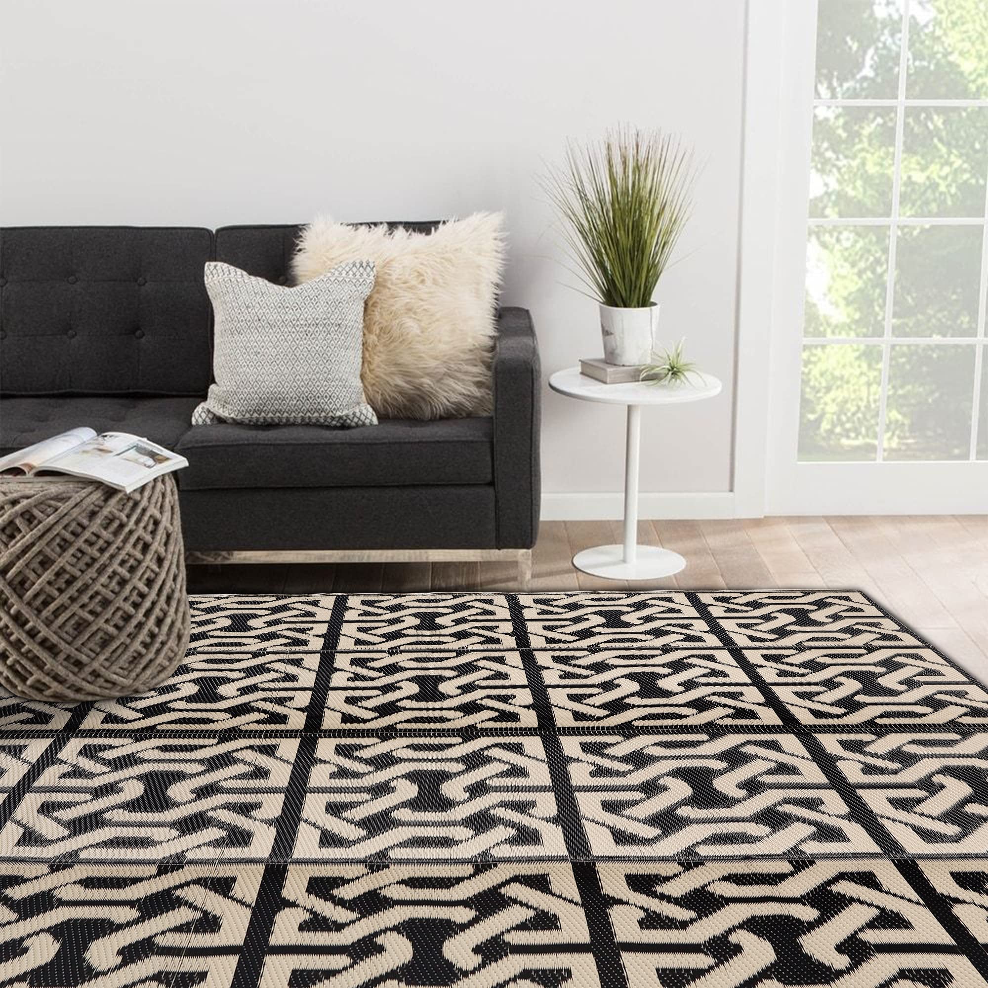 SAND MINE mat showcasing reversible design in black and beige