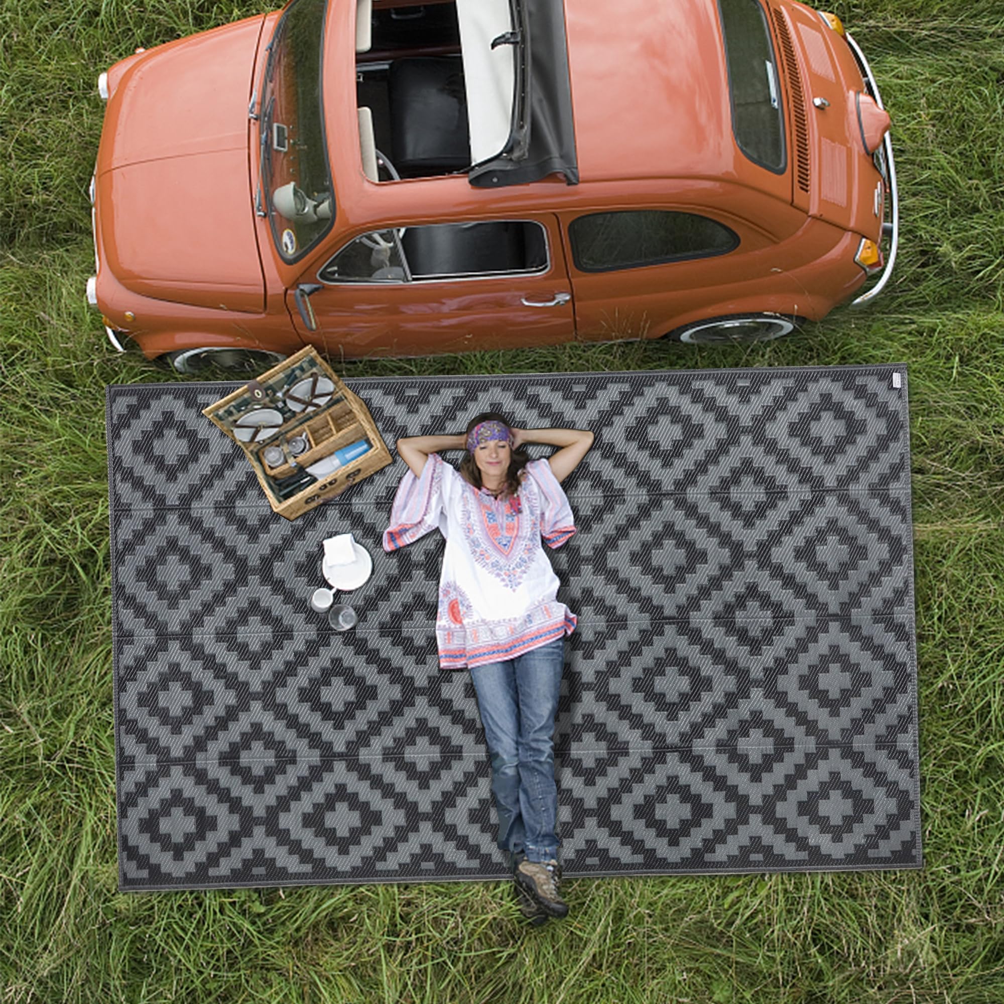 SAND MINE Outdoor Rug 5x8 ft in a garden setting