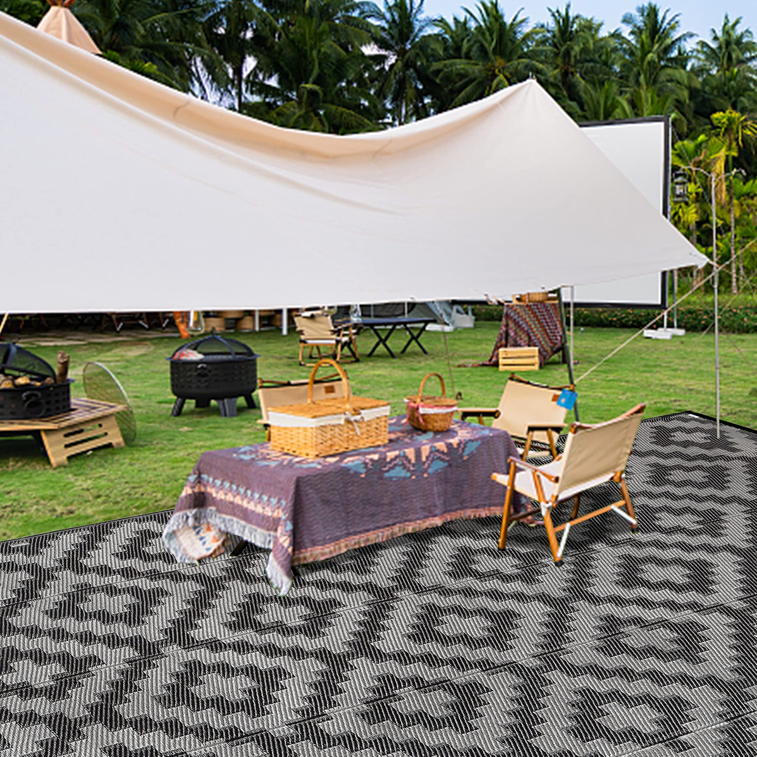 SAND MINE outdoor rug being cleaned with water