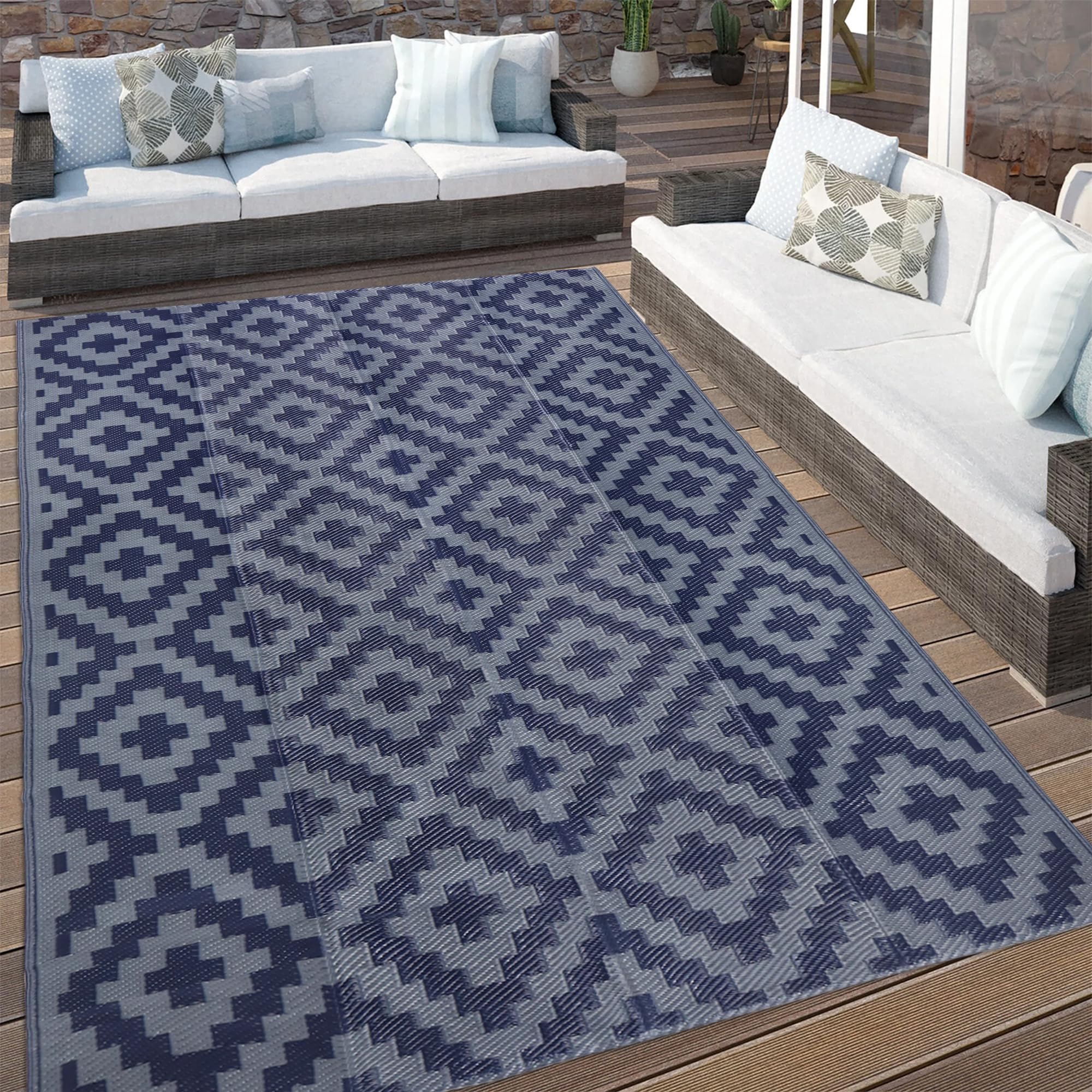 SAND MINE outdoor rug displayed at a picnic