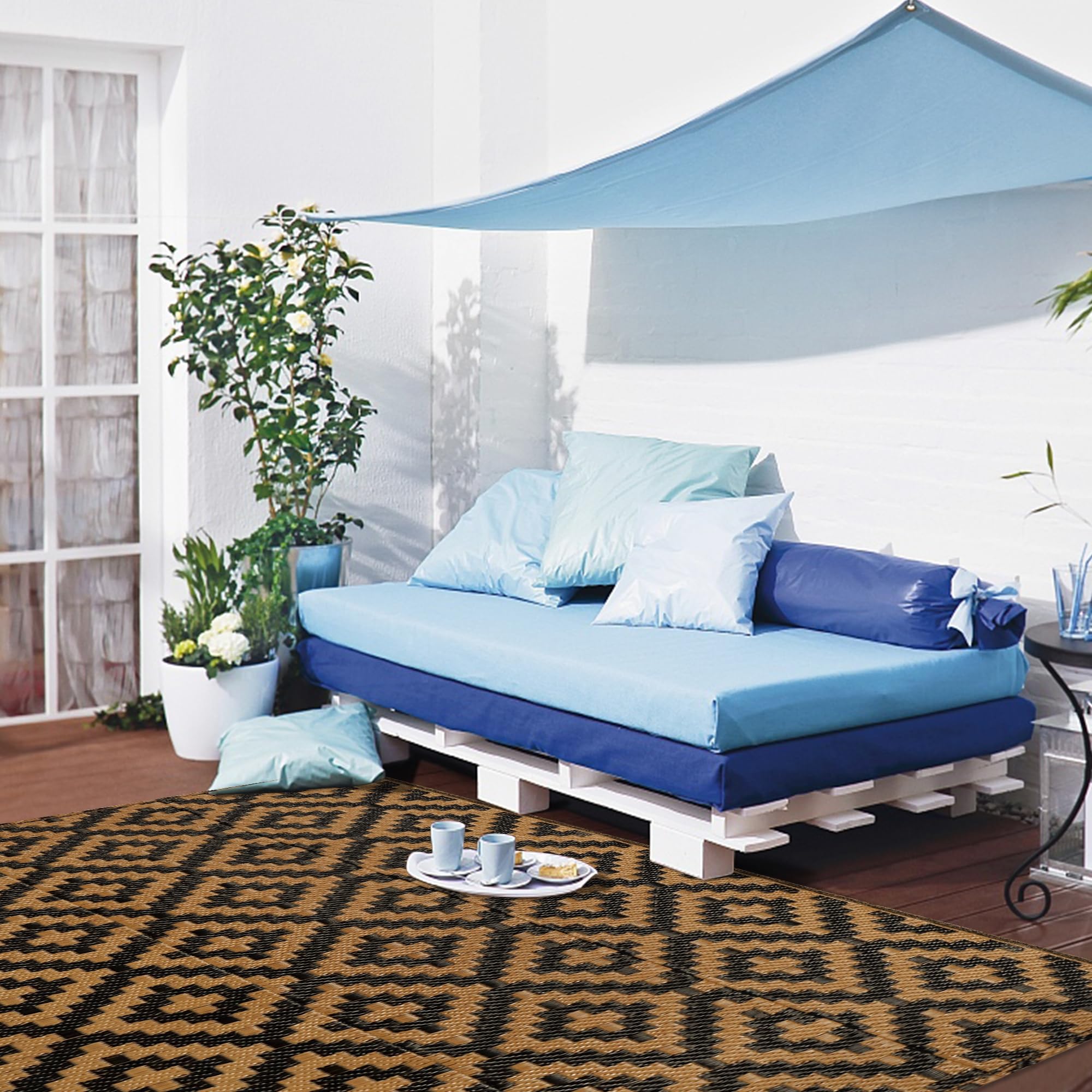 SAND MINE outdoor rug in a camping setup