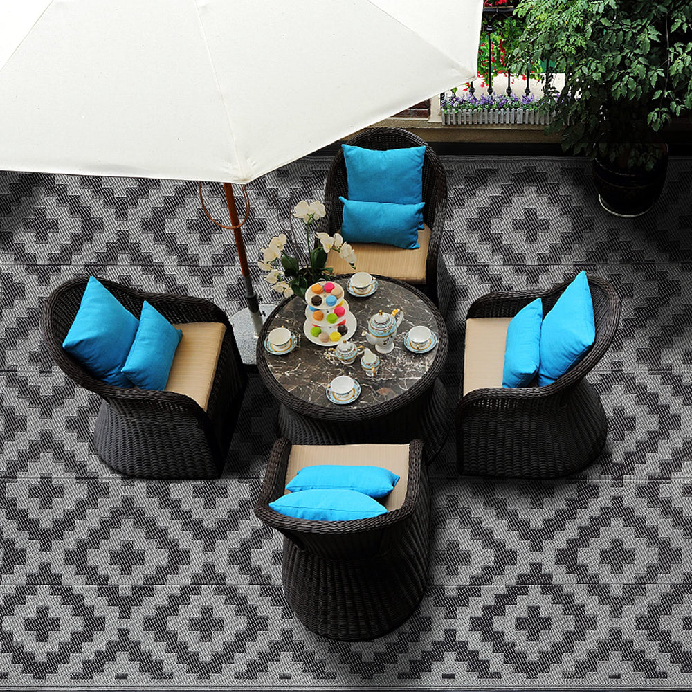 SAND MINE outdoor rug in garden setting