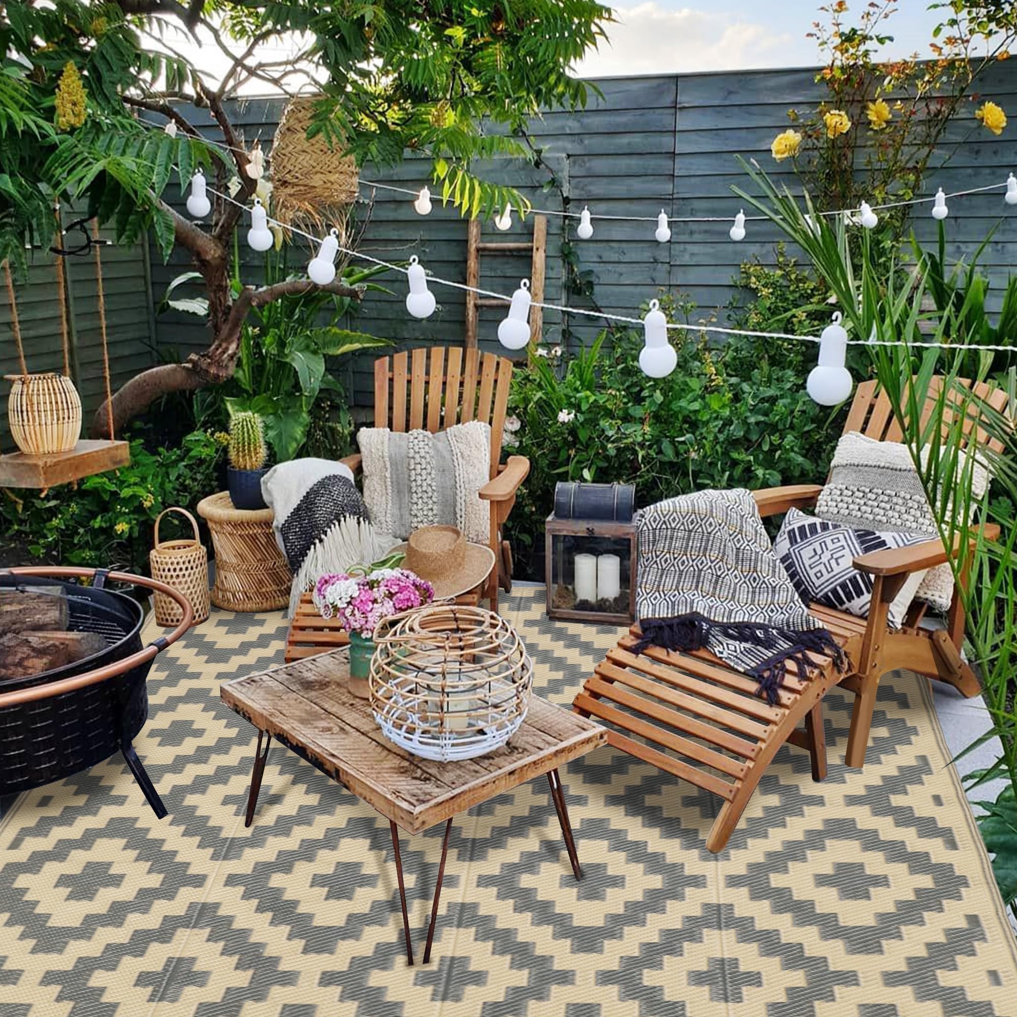 SAND MINE outdoor rug on a deck with plants
