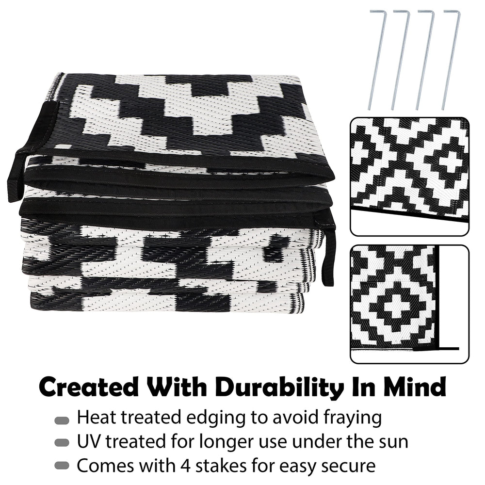 SAND MINE outdoor rug set up on a patio with furniture