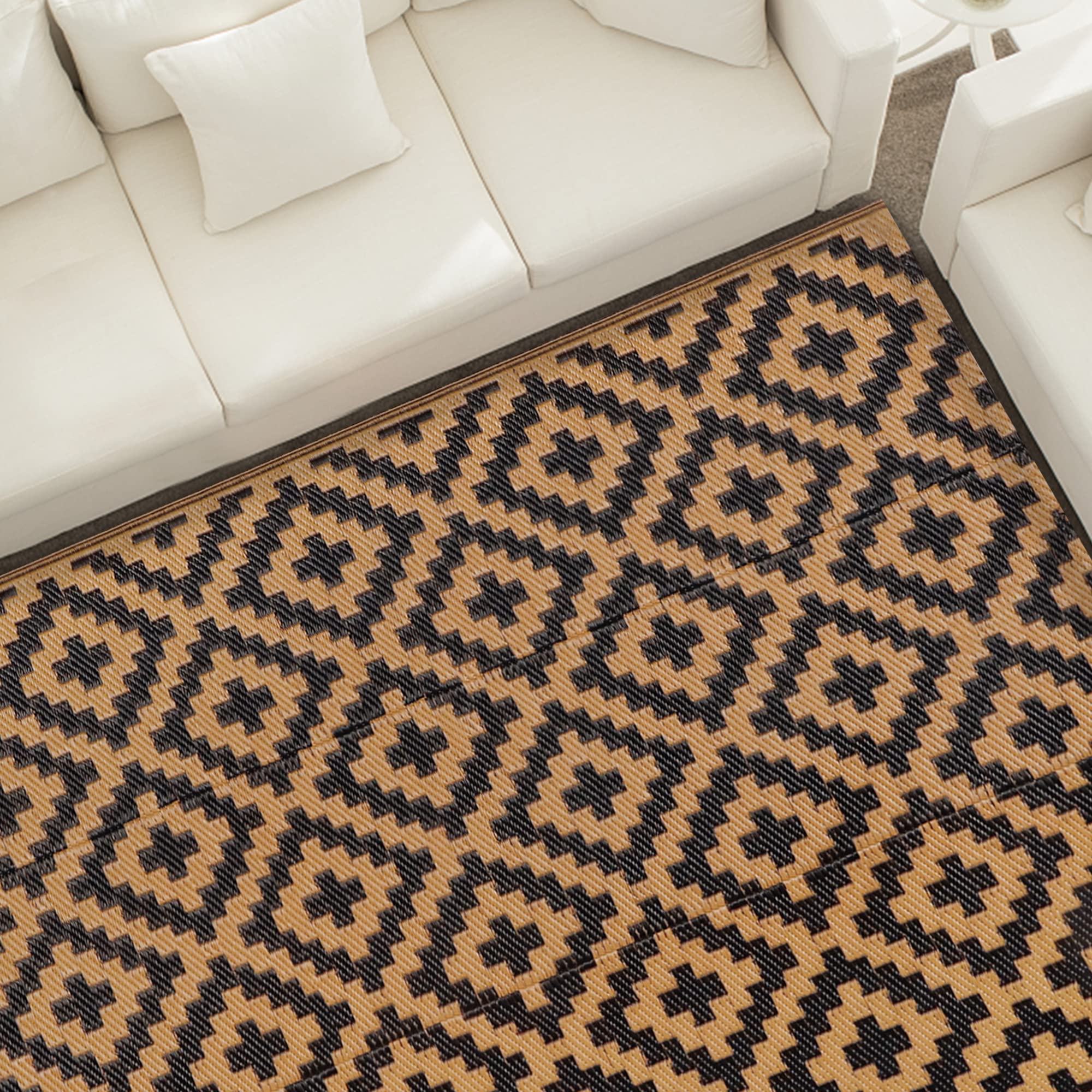 SAND MINE outdoor rug showing reversible side design