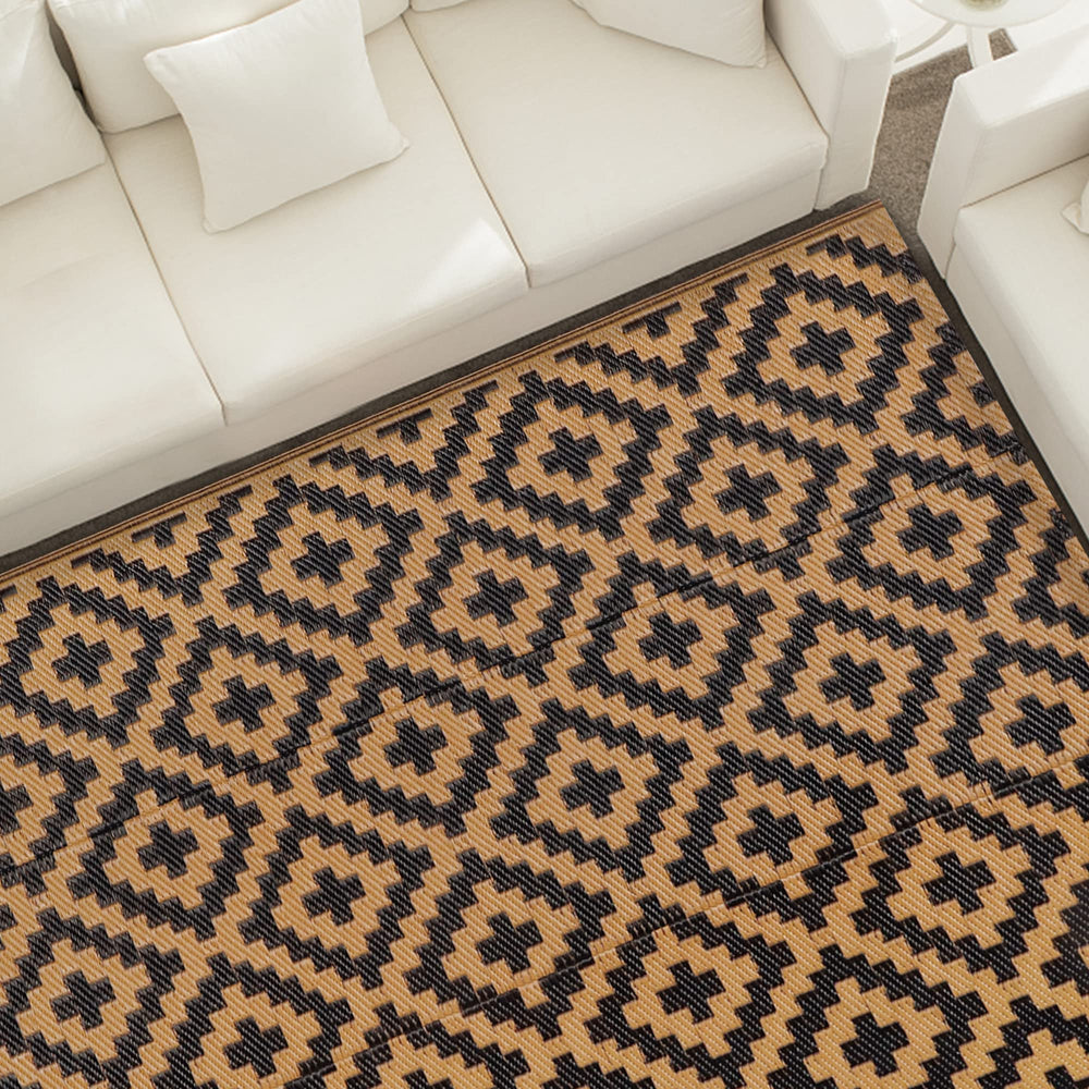 SAND MINE outdoor rug showing reversible side design