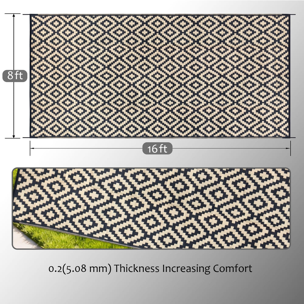 SAND MINE outdoor rug showing the black and beige geometric pattern