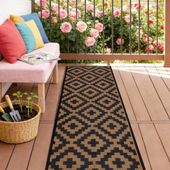 SAND MINE Reversible Outdoor Mat 2.5' x 8' black and brown front view