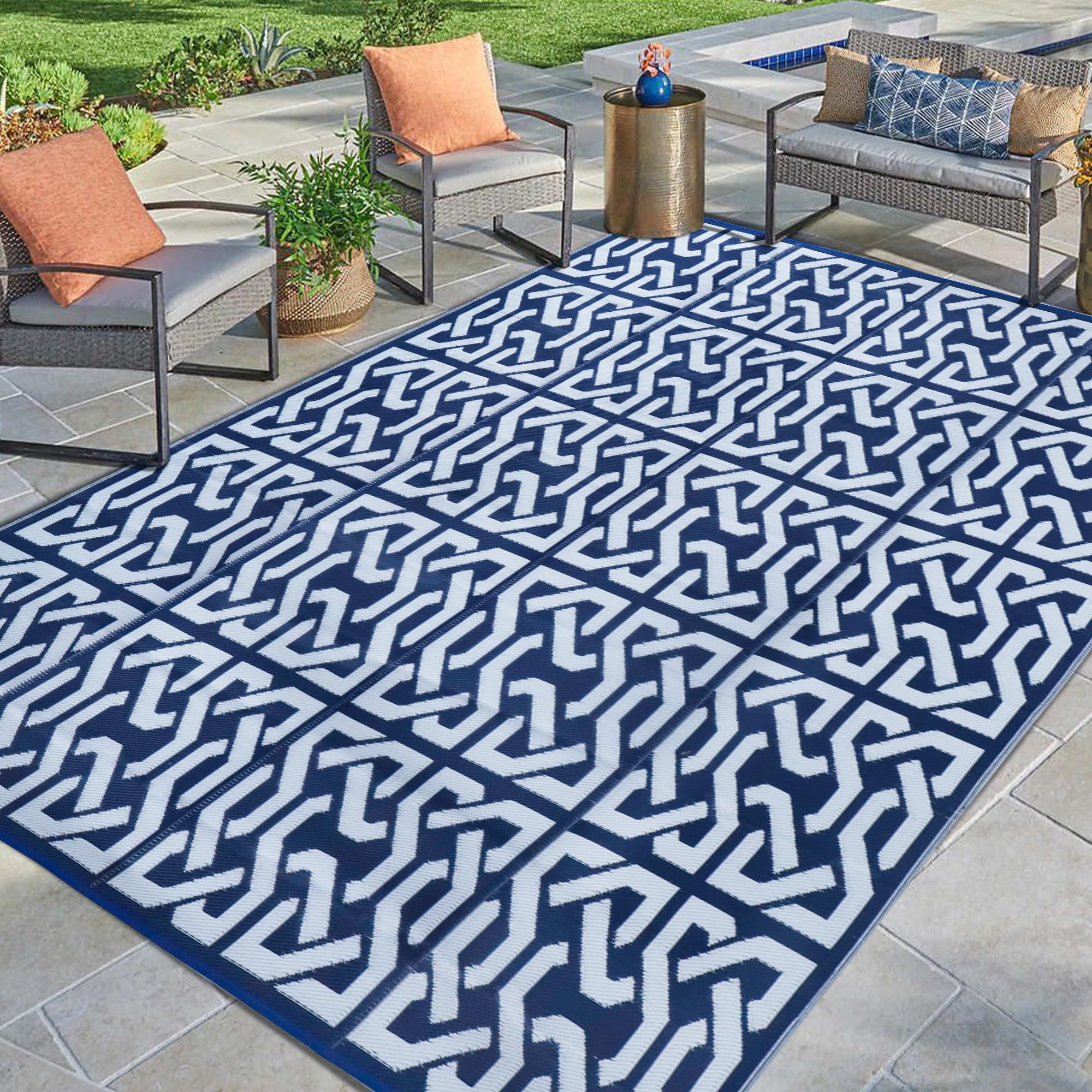 SAND MINE Reversible Outdoor Rug at a picnic setup