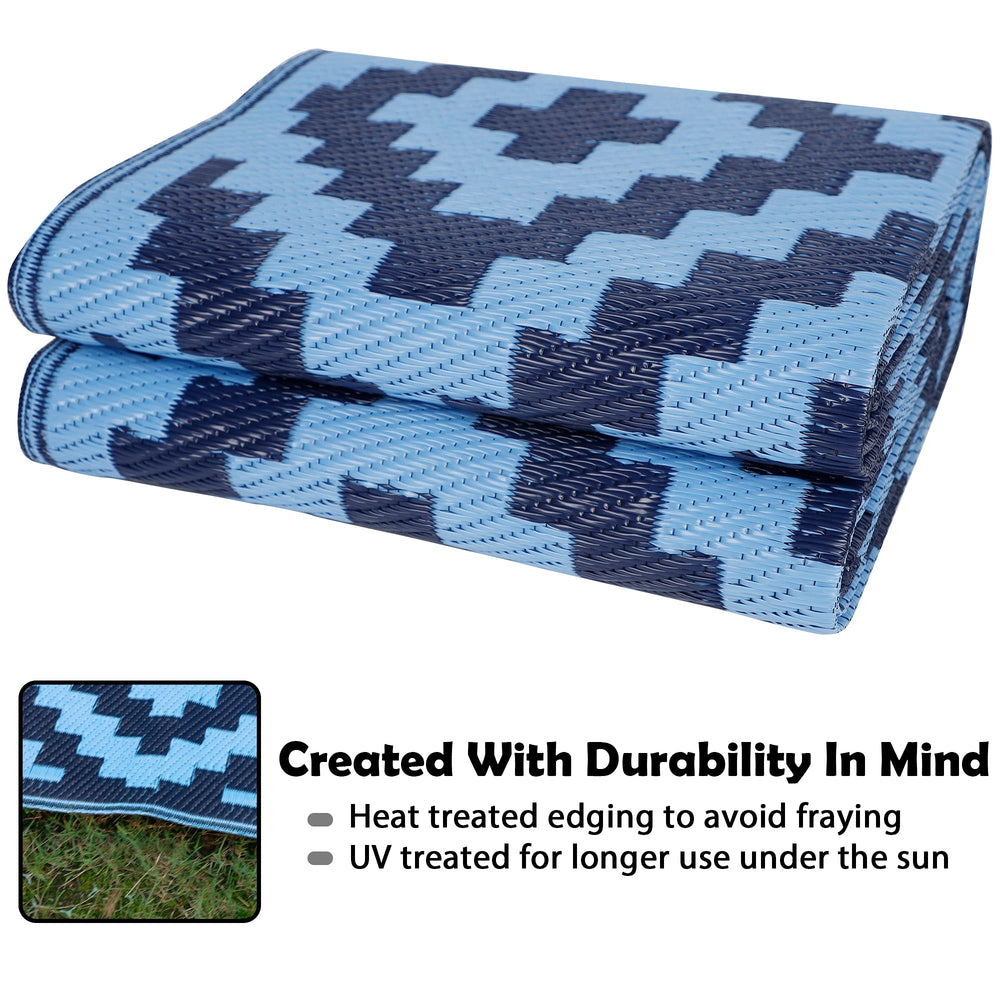 SAND MINE Reversible Outdoor Rug featuring heat- edges
