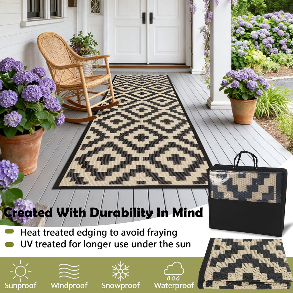 SAND MINE Reversible Outdoor Rug folded in carry bag