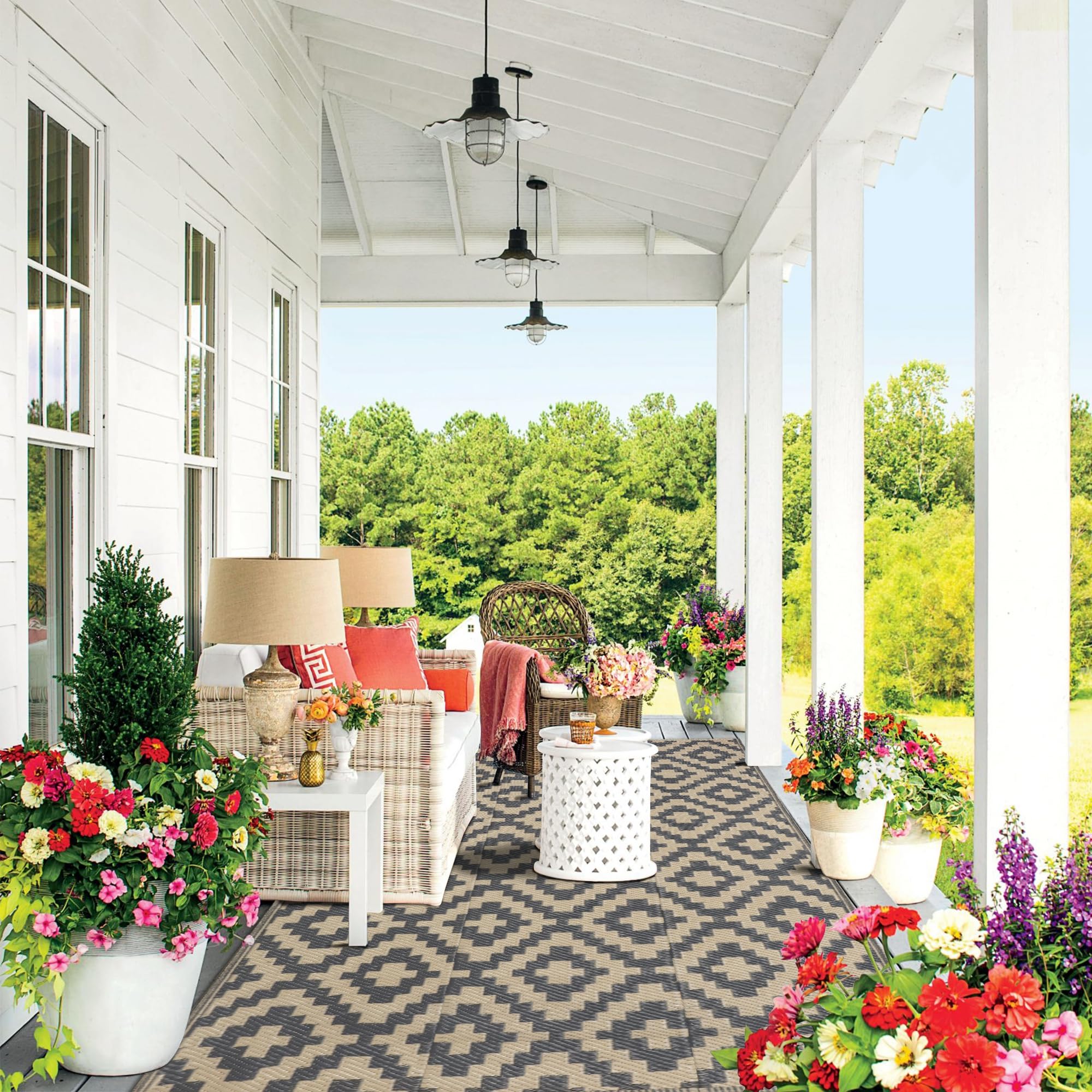 SAND MINE rug displayed outdoors in sunny weather