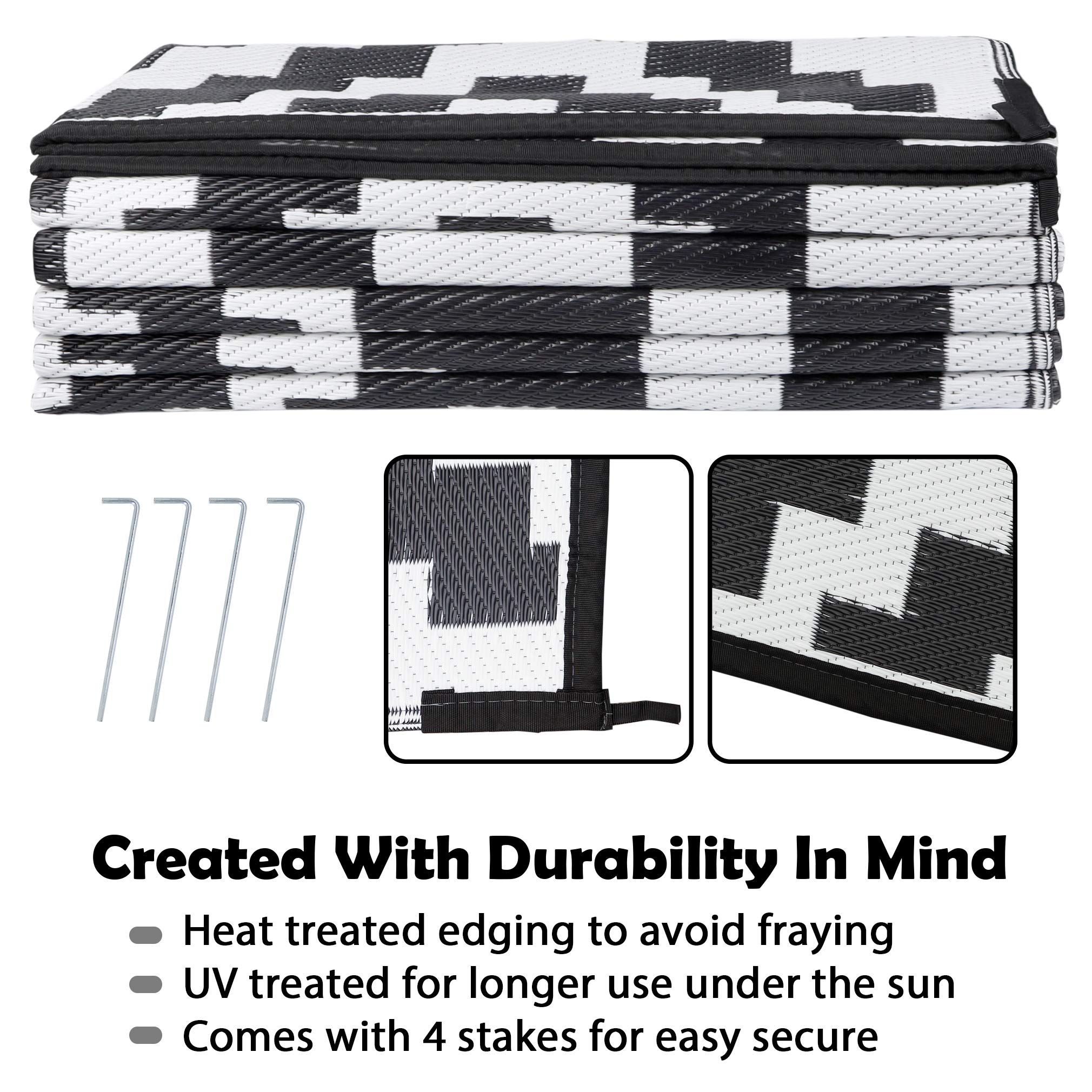 SAND MINE Waterproof Outdoor Rug folded with carrying bag