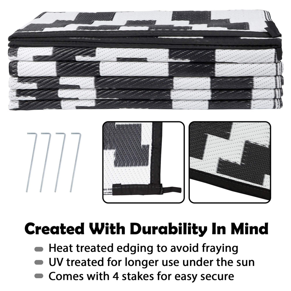 SAND MINE Waterproof Outdoor Rug folded with carrying bag