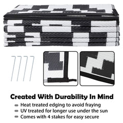 SAND MINE Waterproof Outdoor Rug folded with carrying bag