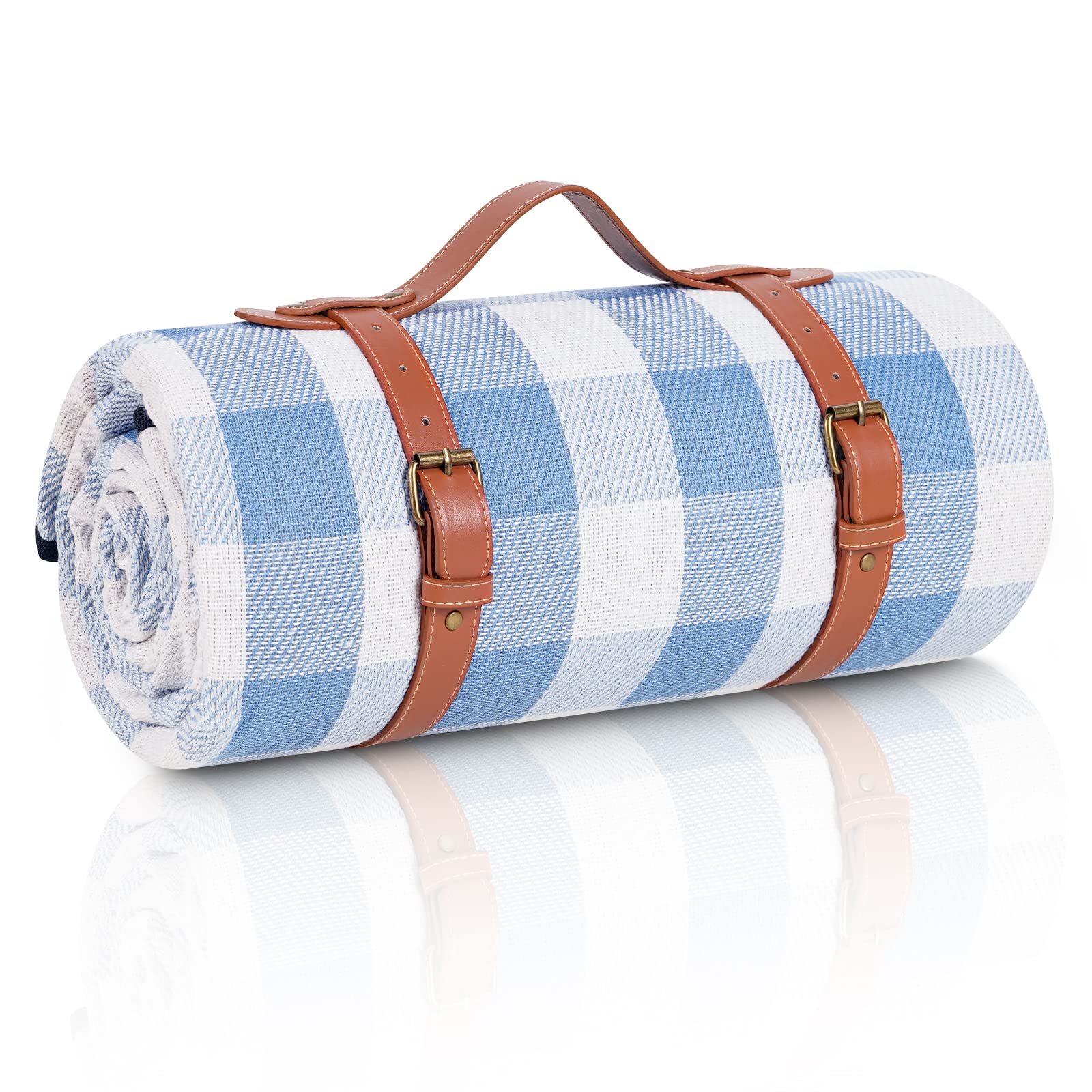 sapsisel 80x60 picnic blanket in white and blue grids, laid out in a park