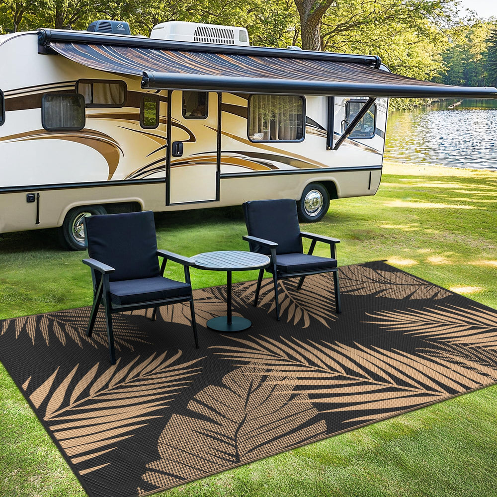 sarben outdoor rug in use at a picnic with food and drinks