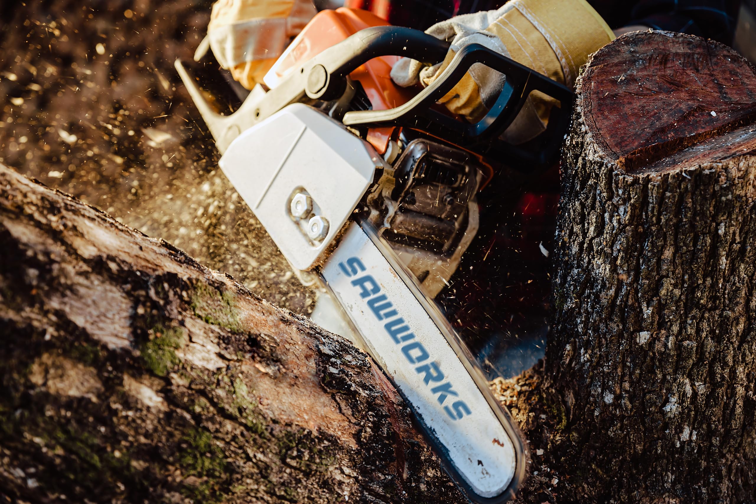 SawWorks chainsaw chain in use on a tree trunk