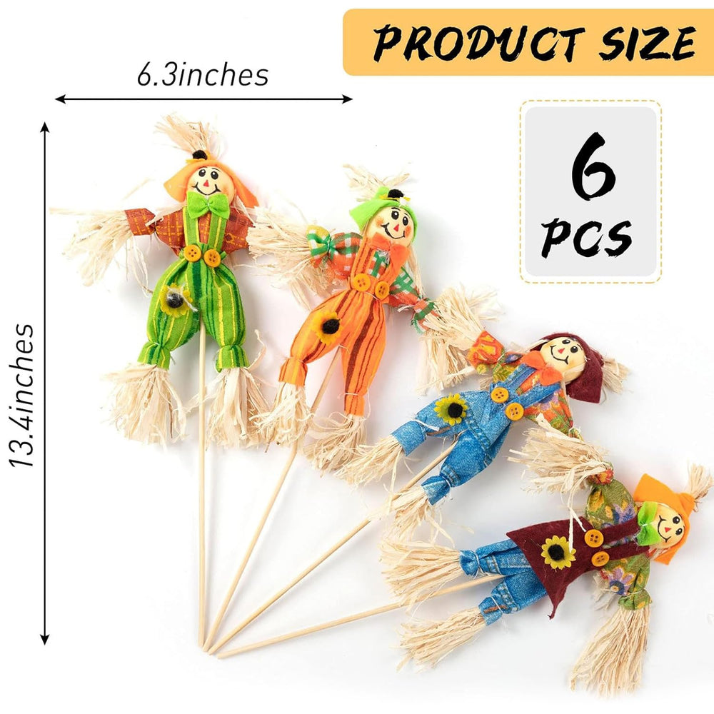 Scarecrow decoration inserted into soil in a yard