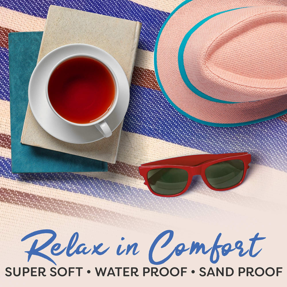 scuddles Waterproof Picnic Blanket in outdoor concert setting