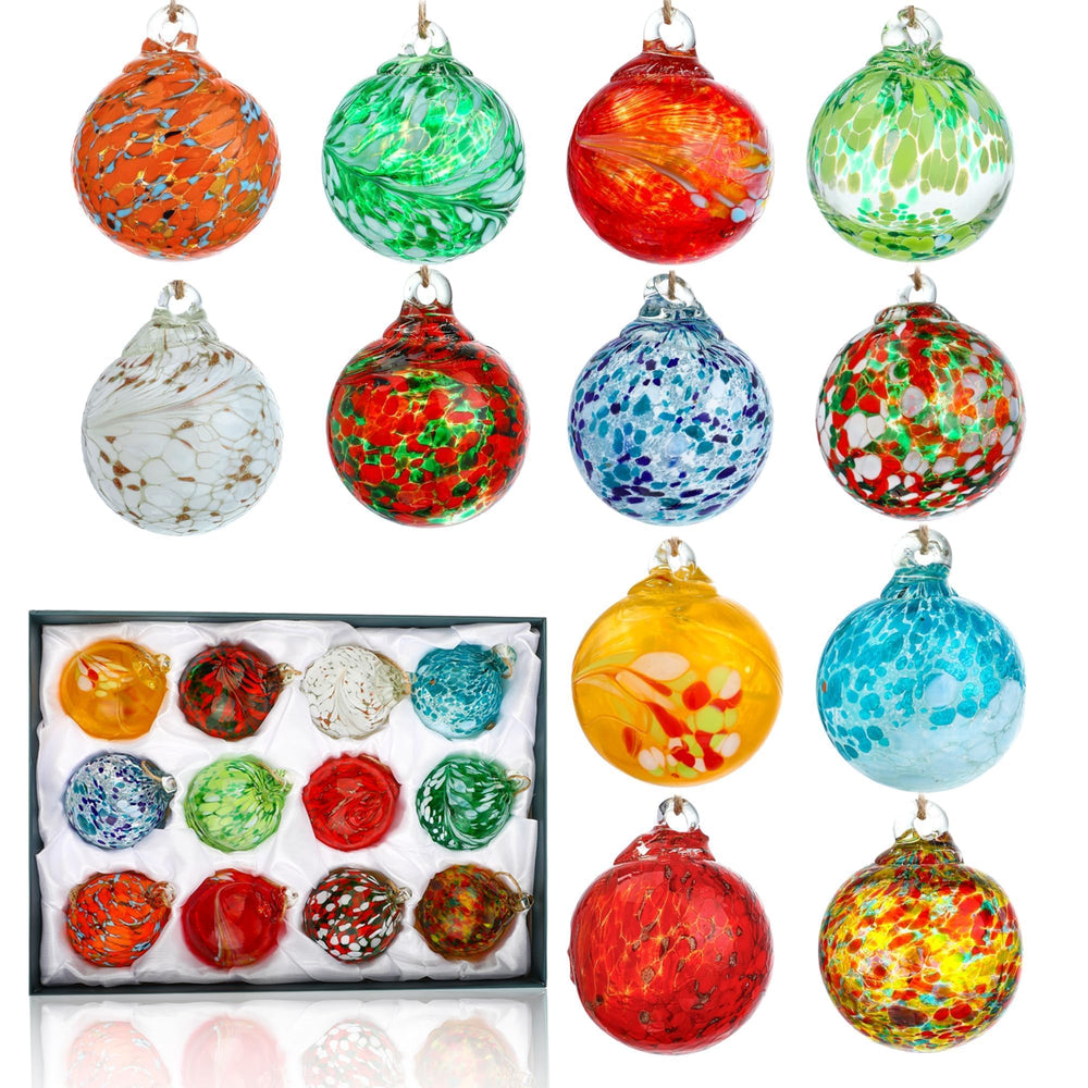 Set of 12 hand-blown glass ornaments displayed outdoors