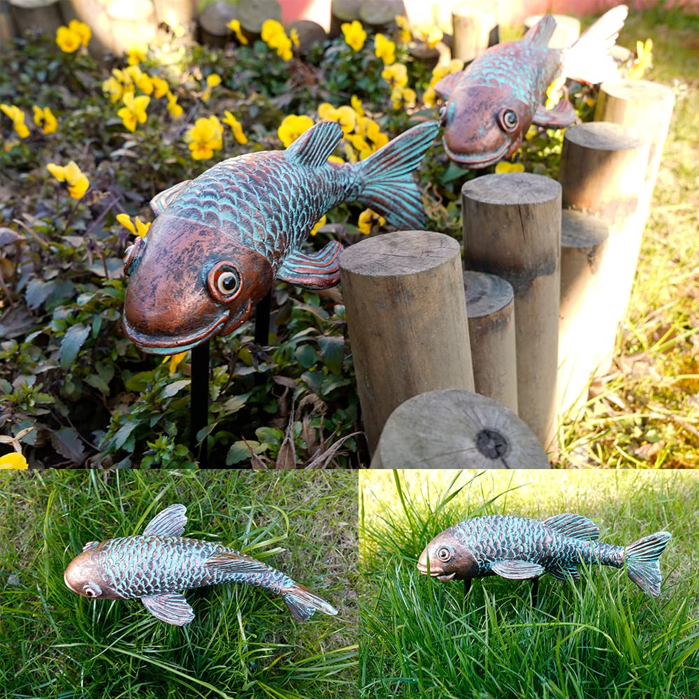 Set of 2 VKEVOC koi fish statues displayed in a garden
