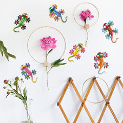 set of 6 hogardeck geckos displayed in a bright garden