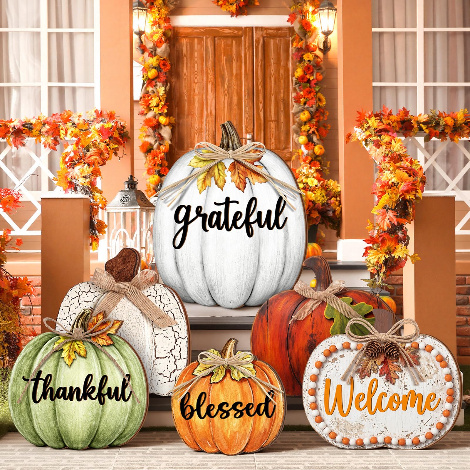 Set of 6 wooden pumpkin signs arranged on a porch