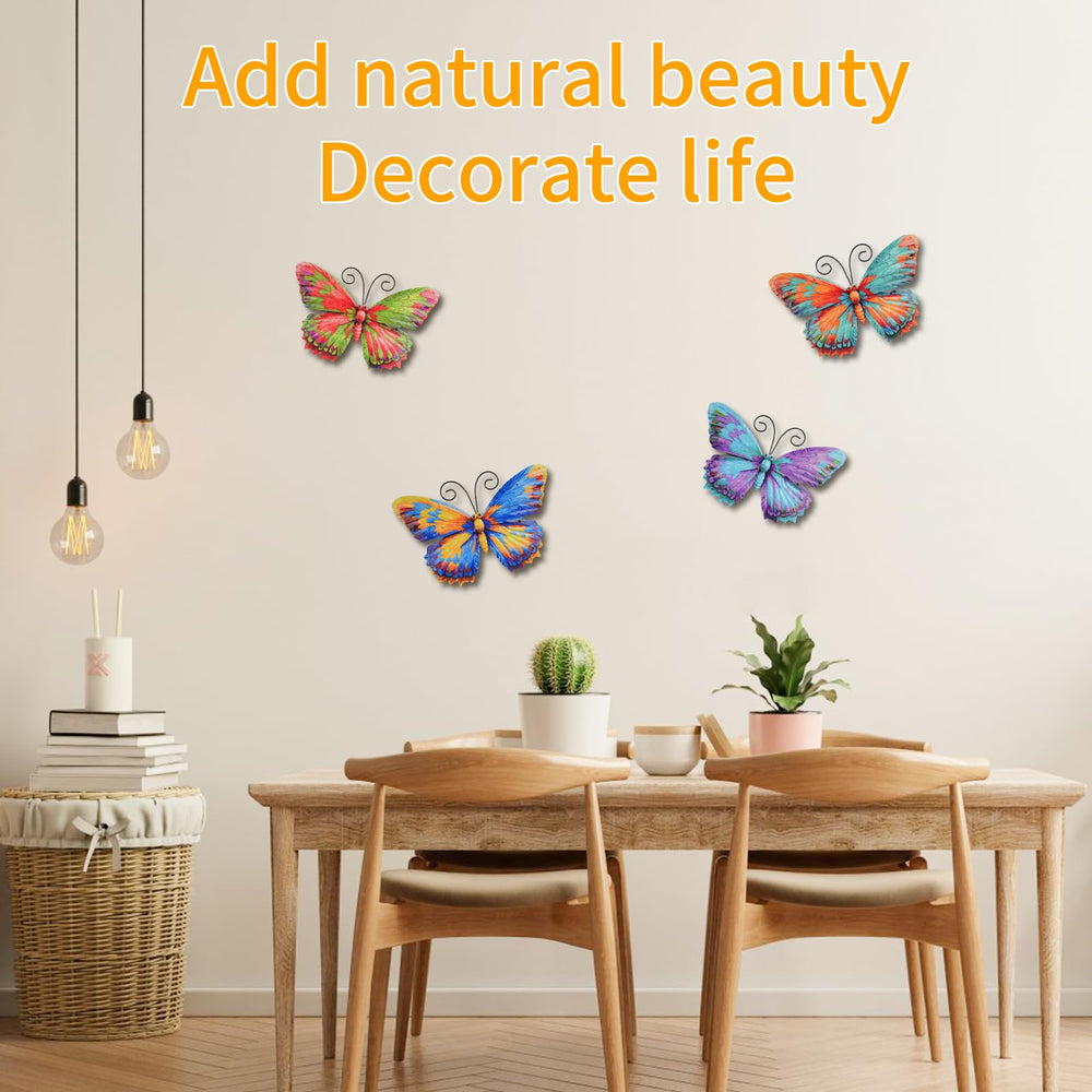 Set of four Junware metal butterflies displayed together