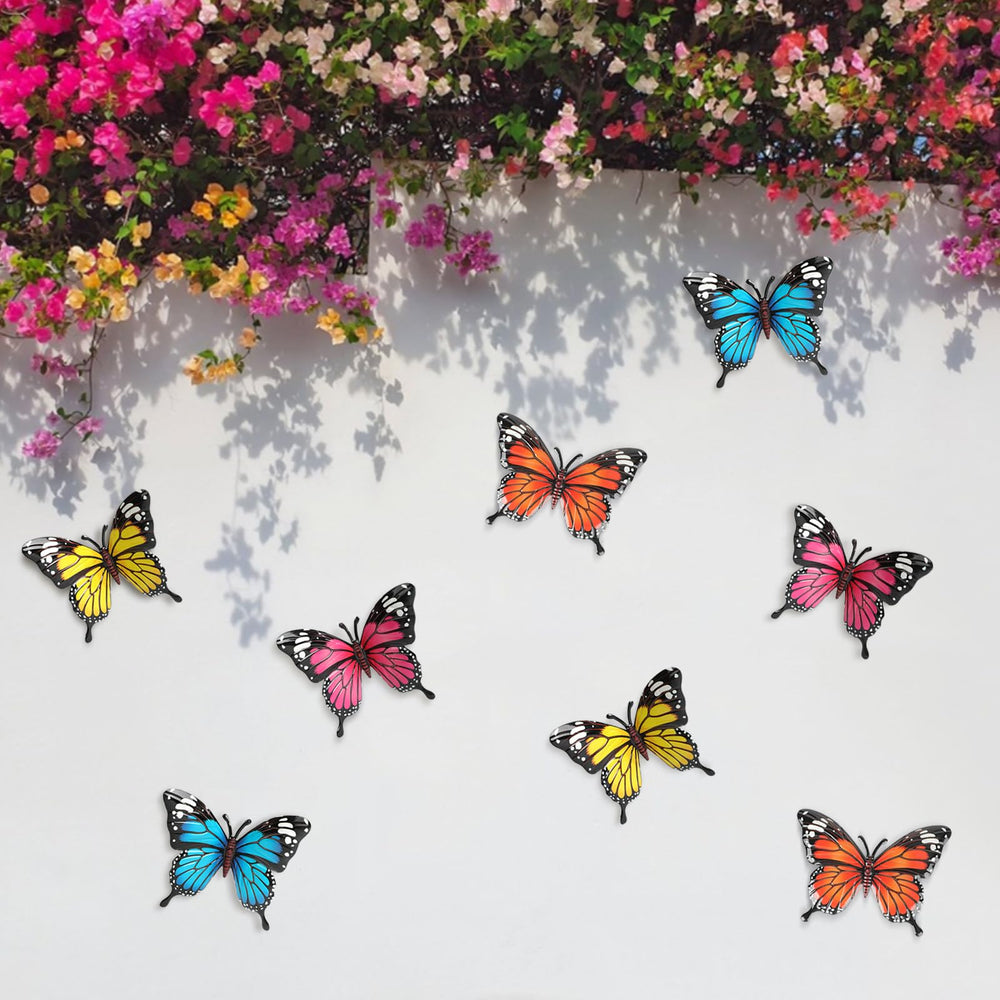 Set of four metal butterflies in various colors