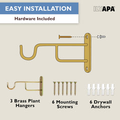 Set of three Ilyapa metal wall hangers in rustic brass finish