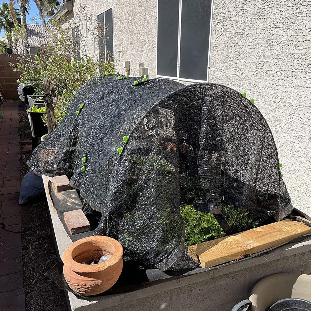 Set up Xuwzenkl grow tunnel in a vegetable garden