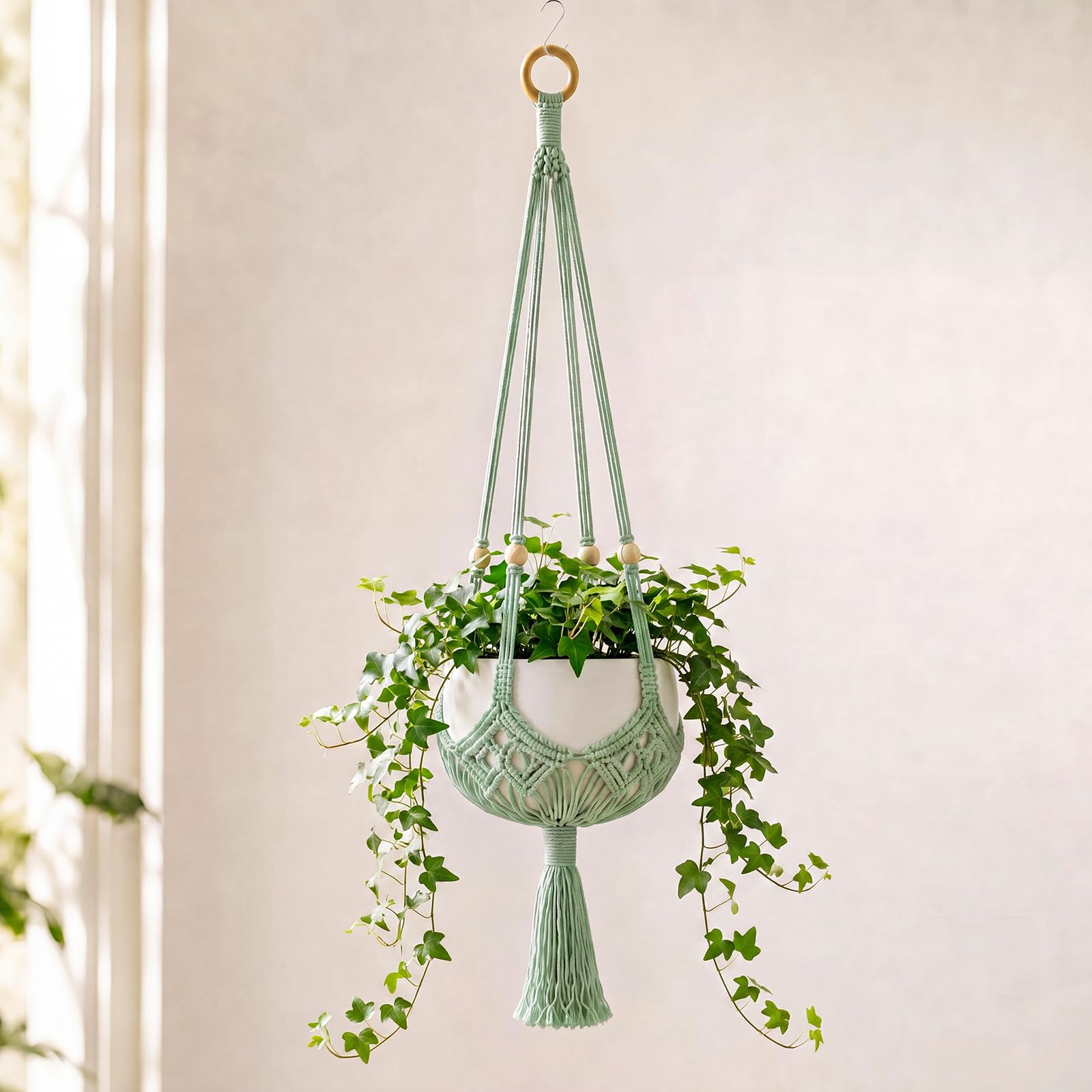 Shappy Boho Macrame Plant Hanger front view in sage green