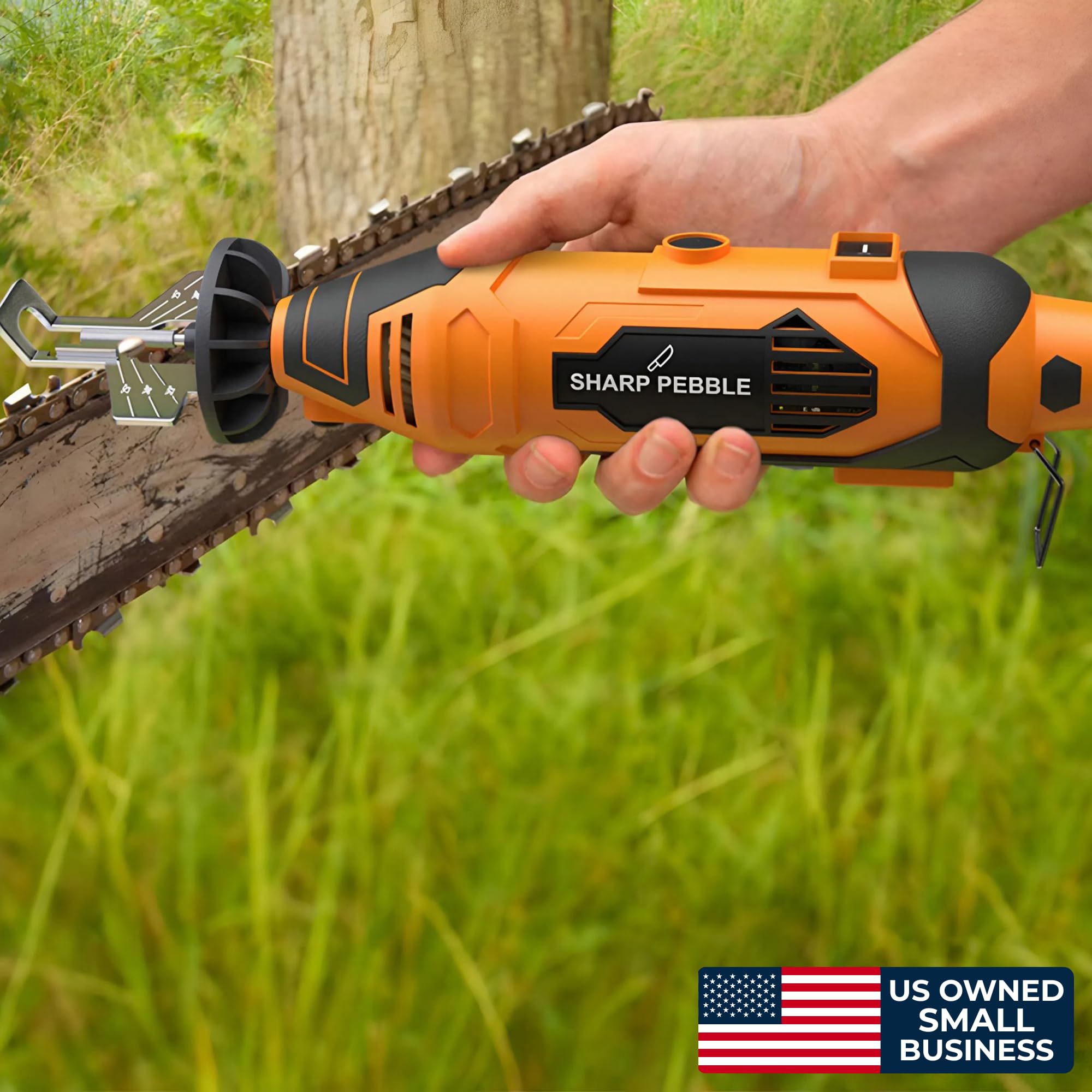 Sharp Pebble chainsaw sharpener in use on chainsaw chain