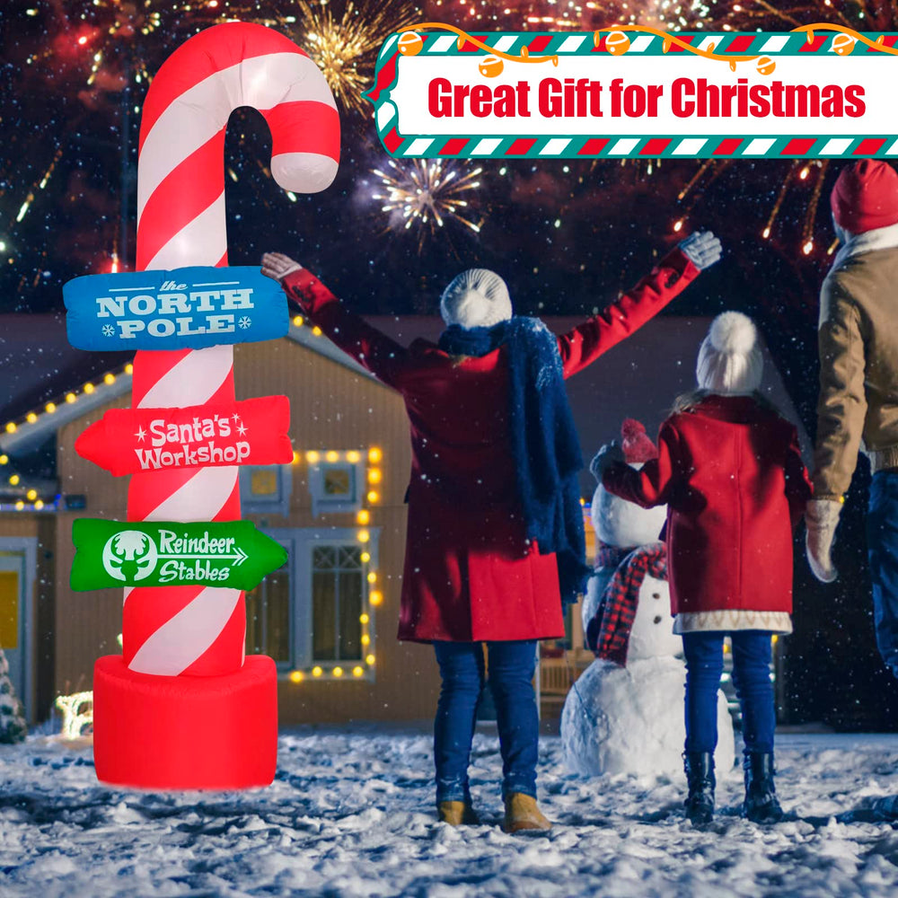 SHDEJTG inflatable candy cane decoration lit up at night