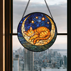 Side view of AMDERVEN Orange Cat Moon suncatcher with sunlight