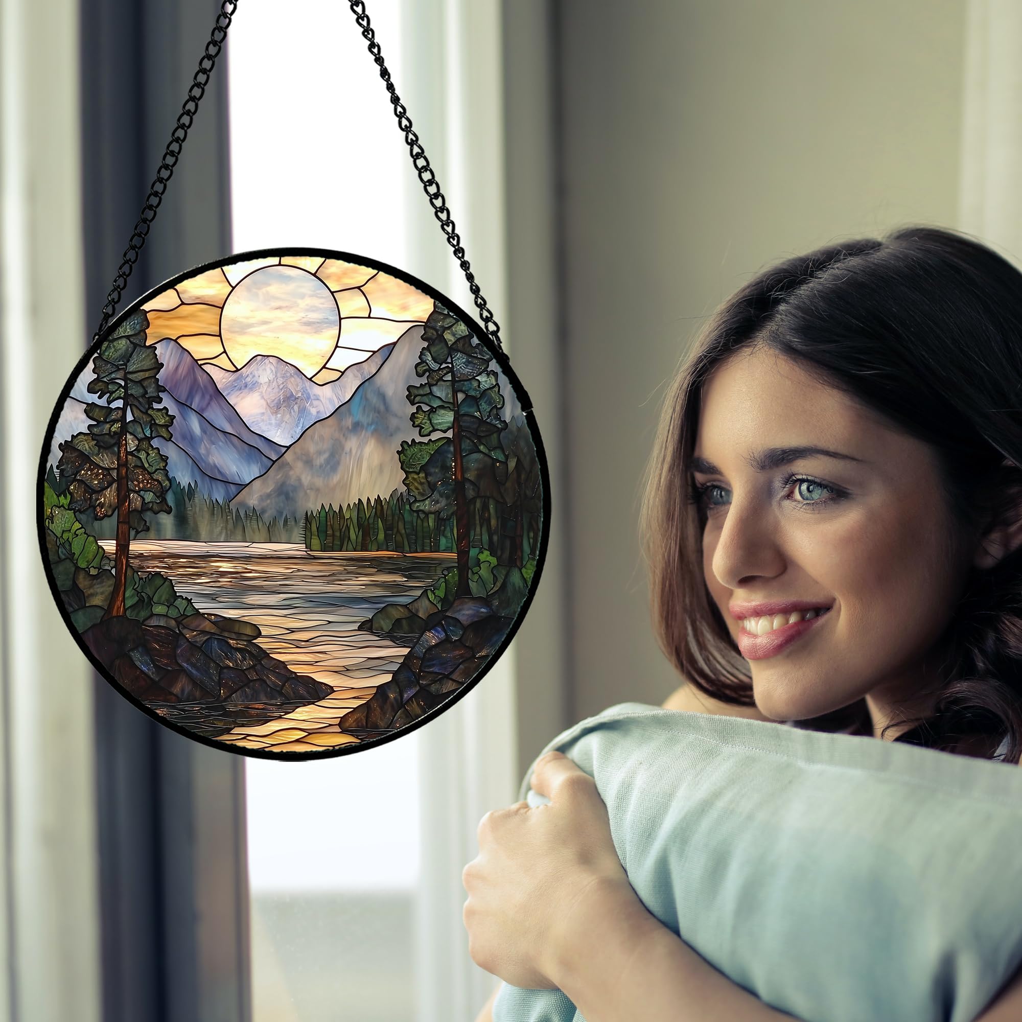 Side view of AMDERVEN stained glass suncatcher hanging in window