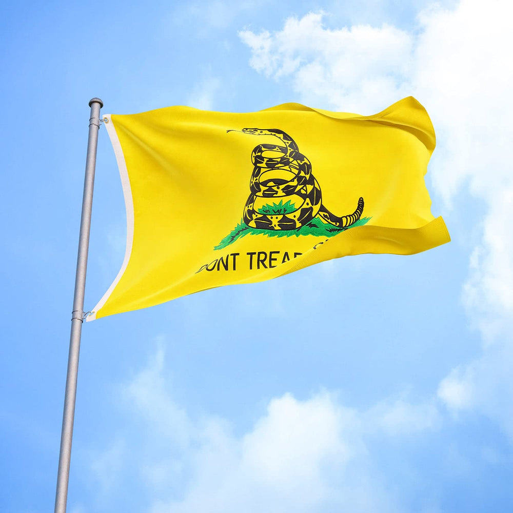 Side view of ARSOF Gadsden flag with two brass grommets