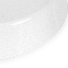 Side view of Austin Planter Saucer on hardwood surface