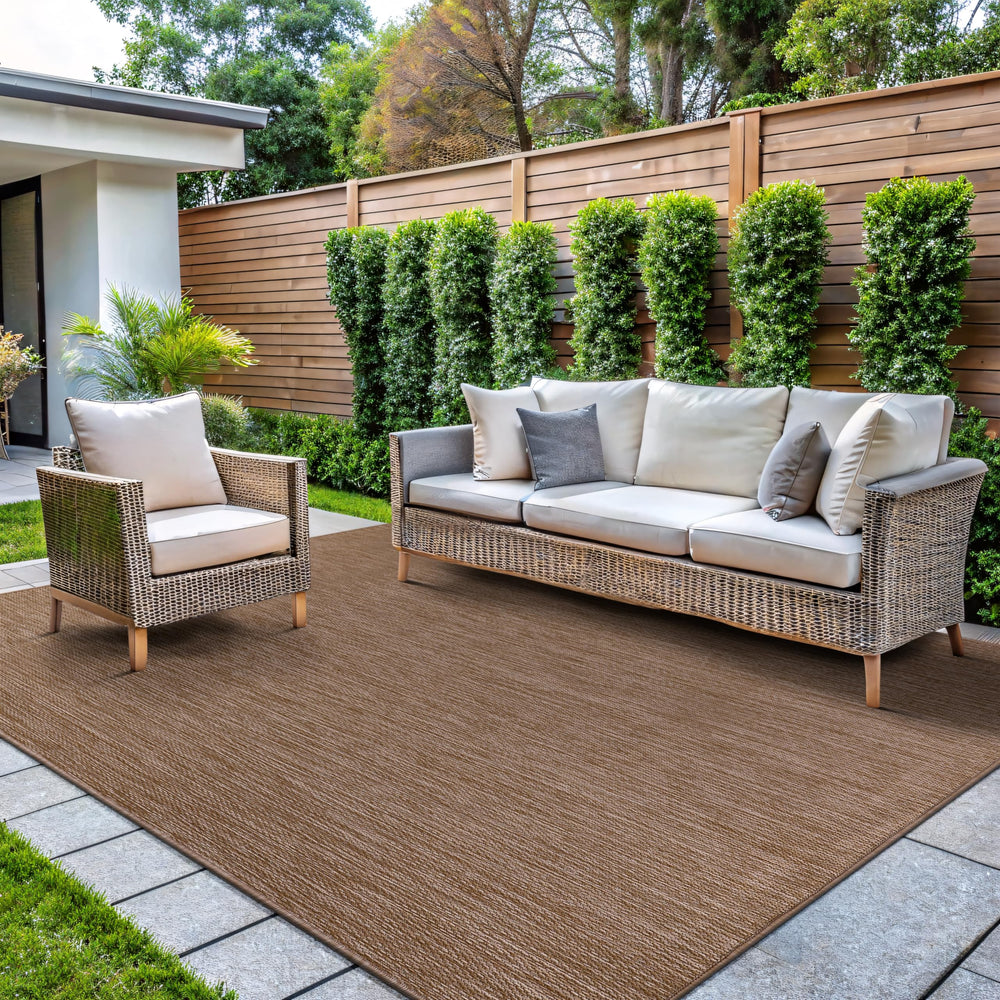 Side view of CAMILSON Outdoor Rug showing thickness