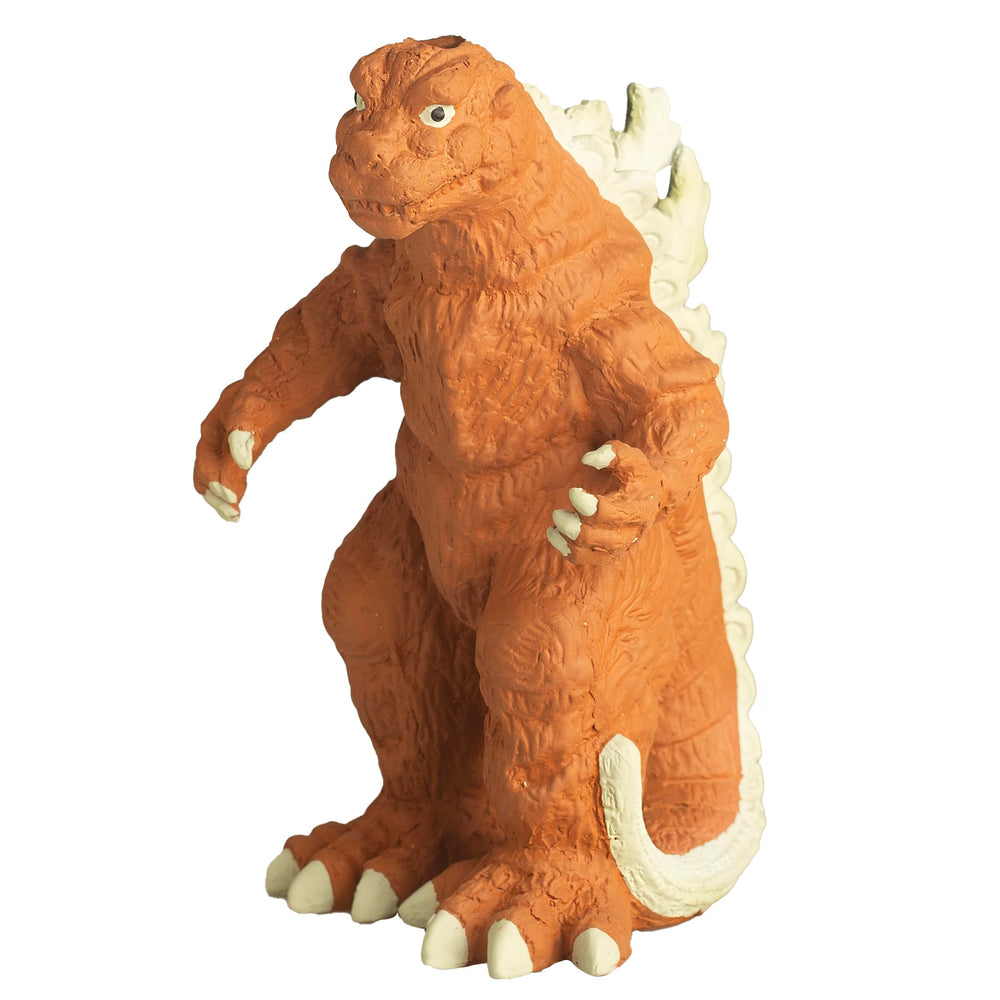 Side view of Chia Pet Godzilla planter and plastic drip tray