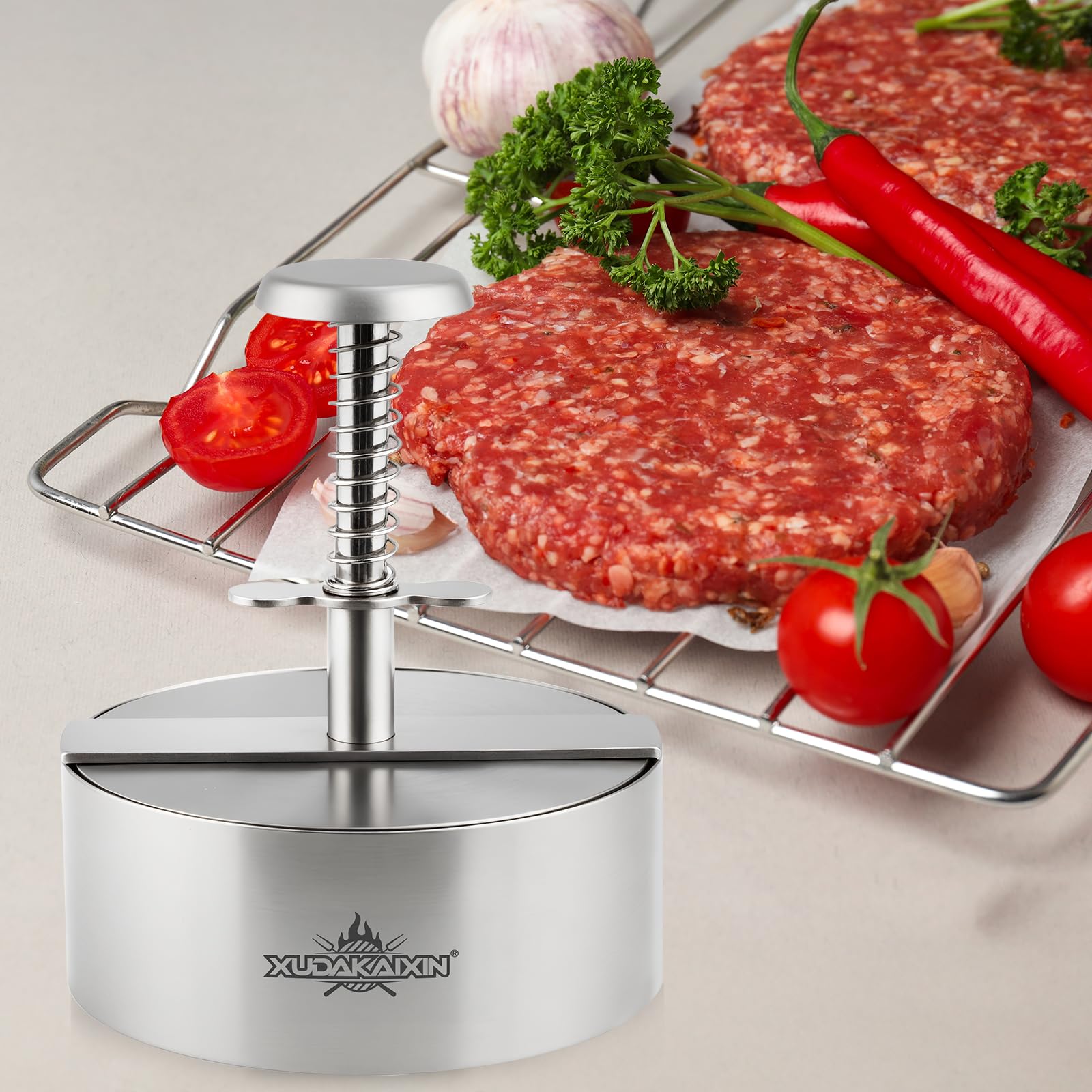 Side view of Cuexorik hamburger press demonstrating easy release feature
