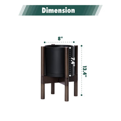 Side view of D'vine Dev 8 inch black pot on wooden stand