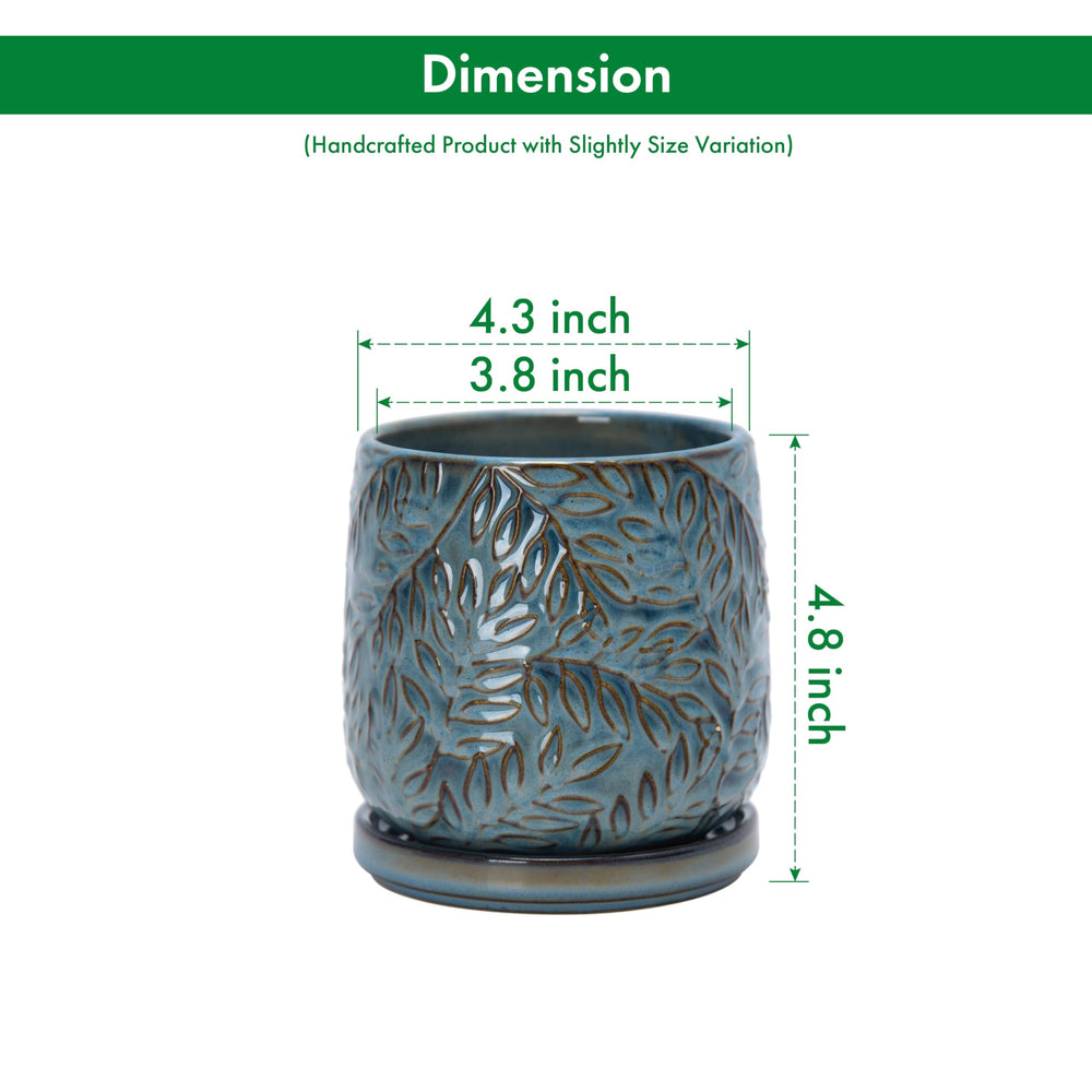 Side view of D'vine Dev embossed leaves ceramic planter in Ocean Teal