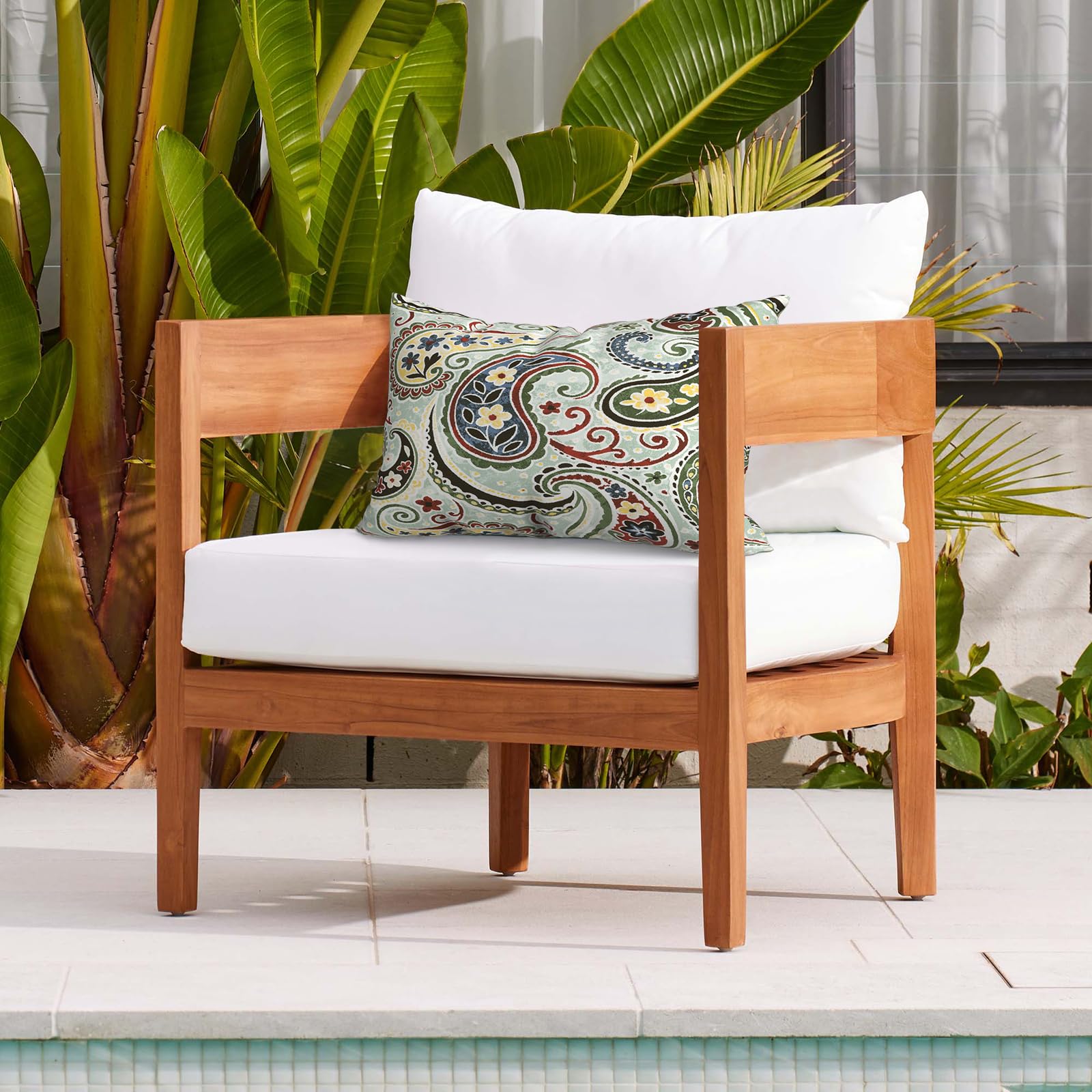 Side view of DYTXIII Outdoor Lumbar Pillow showing vibrant paisley pattern
