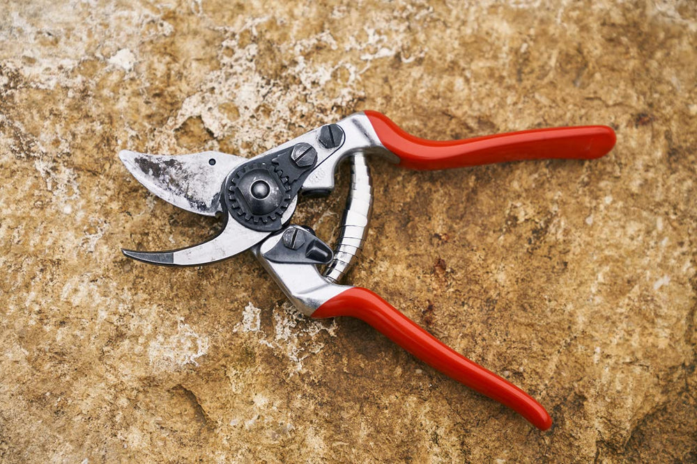 Side view of FELCO F 14 shears showing ergonomic rubberized grips
