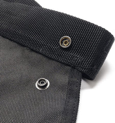 Side view of FORESTER Chainsaw Chaps worn by a person