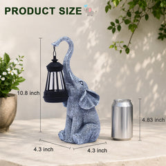 Side view of Goodeco elephant statue in garden setting